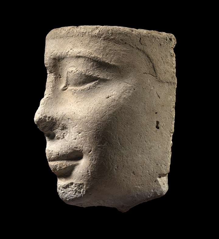 Egyptian stucco profile head of a young man